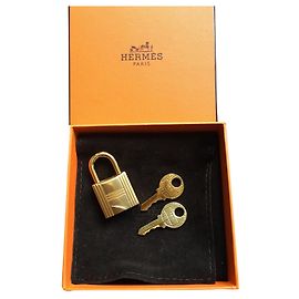 Cadenas Hermès doré pour sac a main Birkin ou Kelly Neuf Doré