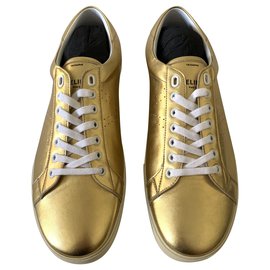 Céline Baskets Triomphe en cuir doré Doré