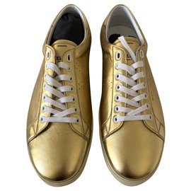 Céline Baskets Triomphe en cuir doré Doré
