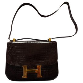 Hermès-Constance-Castanho escuro