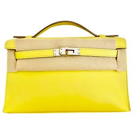 Hermès Kelly Clutch hellgelb Gelb