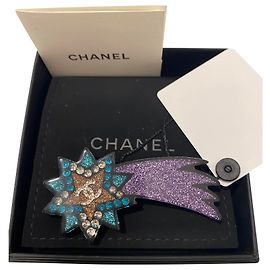 Chanel broche Étoile Filante en résine multicolore. Article neuf Multicolore
