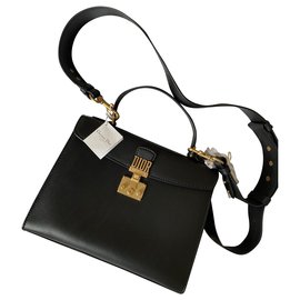 Christian Dior-Bolsa Dioraddict com alça superior-Preto