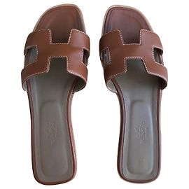 Hermès Oran sandals leather gold Caramel