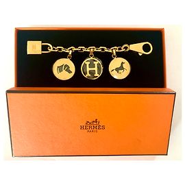 Bijou de sac Hermès Olga Doré