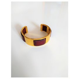 Hermès-Magnífica pulseira de latão em couro de novilho dourado Hermès-Marrom