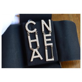 Chanel-Boucles d’oreilles Chanel logo « CHA NEL »-Argenté,Doré