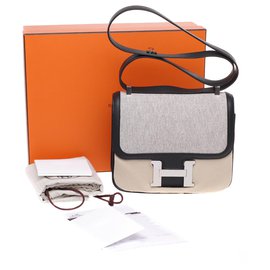 Hermès-Limited Edition / New / Hermès Constance 24 bi-material in beige canvas and black leather, New condition, full st!-Black,Beige