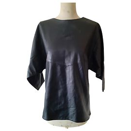 Autre Marque Top de couro preto com mangas morcego Preto