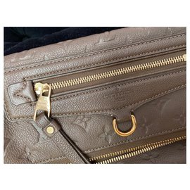 Louis Vuitton-Louis Vuitton Pochette Espumante Couro Empreinte Terre (Castanho)-Marrom