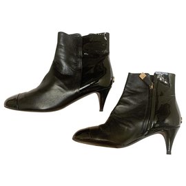 Chanel-CC black leather and patent ankle boots-Black