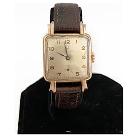 Autre Marque-Universal 18 k yellow gold-Golden