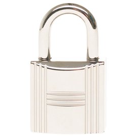 Hermès-Cadeado Hermès em prata Palladium para bolsas Birkin ou Kelly, nova condição com 2 chaves e bolsa original!-Prata