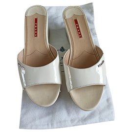 Prada Mulas de cuña Blanco