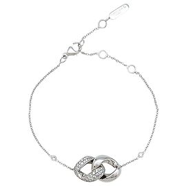 Messika "Infinity" bracelet in white gold and diamonds. Other