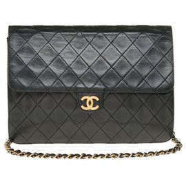 Chanel-Chanel Classique Handtasche aus schwarzem gestepptem Lammfell, garniture en métal doré-Schwarz