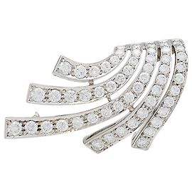 Broche Chaumet "Volutes" en oro blanco, diamantes. Otro