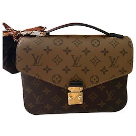 Louis Vuitton Pochette Metis Monogram Reverse Caramel Caramel