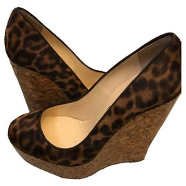 louboutin femme compensé