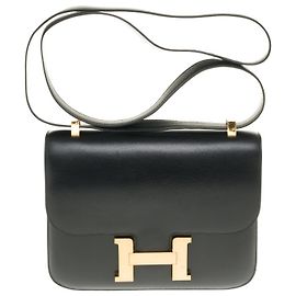 Splendid Hermès Constance em couro caixa preta, acabamento de metal dourado em excelentes condições Preto