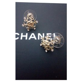 Chanel-Boucles oreilles flocon Chanel-Bijouterie dorée
