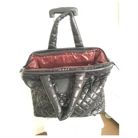 Chanel-Travel bag-Black,Silver hardware