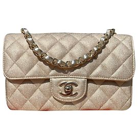 Chanel Mini pele de cordeiro acolchoada clássica ouro metálico de aba única Dourado