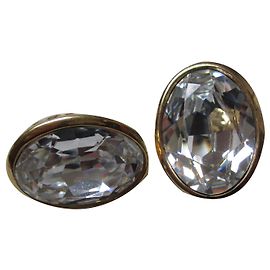 Boucles d'oreilles clips cabochons Yves Saint Laurent dorées Doré
