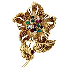Spilla Cartier, "Fiore" in oro giallo, Diamants, smeraldi, rubini e zaffiri. Altro