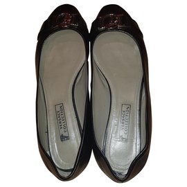 Sapatilhas Versace em couro preto Preto