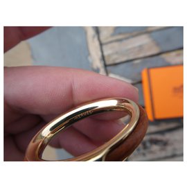 Hermès-anneau de foulard hermès modéle kyoto en acier permabrass et cuir-Bijouterie dorée