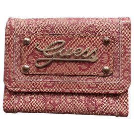 Guess-Ratet mal, rosa monogrammierte Brieftasche-Pink