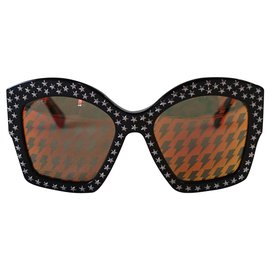 Gucci-Des lunettes de soleil-Noir