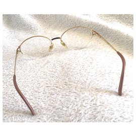 Christian Dior-Des lunettes de soleil-Doré