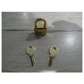 Hermès-Cadeado de aço dourado Hermès com 2 chaves-Gold hardware