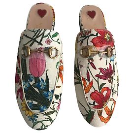 Gucci Mulas de tela Princetown Flora Print Outro