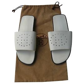 Hermès HERMES Mules cuir blanches neuves H Perforé T37 Blanc