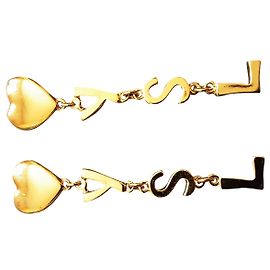 YVES SAINT LAURENT.  Letters Logo Clips. Gold hardware