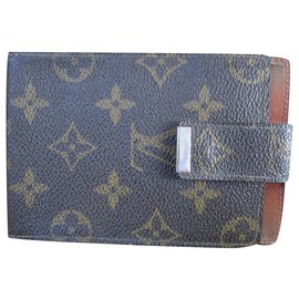 Louis Vuitton-Monogramm Leinwand Scheckhefthalter.-Braun