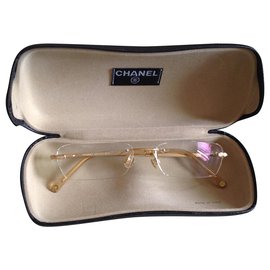 Chanel-Des lunettes de soleil-Doré