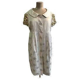 Vestido Moschino de algodão com flores de plástico cor creme Fora de branco