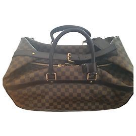 Louis Vuitton bolsa de viaje de luis vuitton. Castaño