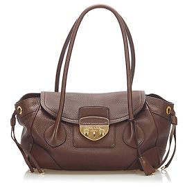 Bolsa de ombro de couro Prada Brown Sound Lock Marrom