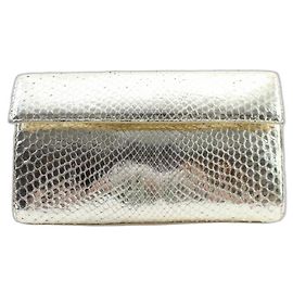 Nancy Gonzalez Clutch metálico de pitón dorado Dorado