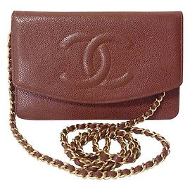 Chanel Caviarskin bolsa clutch de couro marrom com corrente dourada Marrom