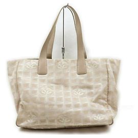 Chanel Bolsa de compras Bege New Line MM Outro