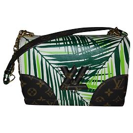 Bolsa Louis Vuitton Twist MM em couro e lona Multicor