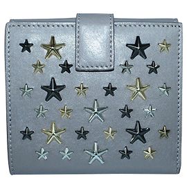 Jimmy Choo Cartera pequeña de cuero con tachuelas de estrellas gris Gris