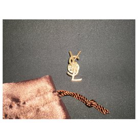 Yves Saint Laurent-broche vintage yves st laurent como novo com bolsa-Dourado