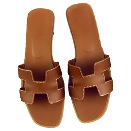 Mules Hermès Oran em couro marrom Marrom Castanho escuro